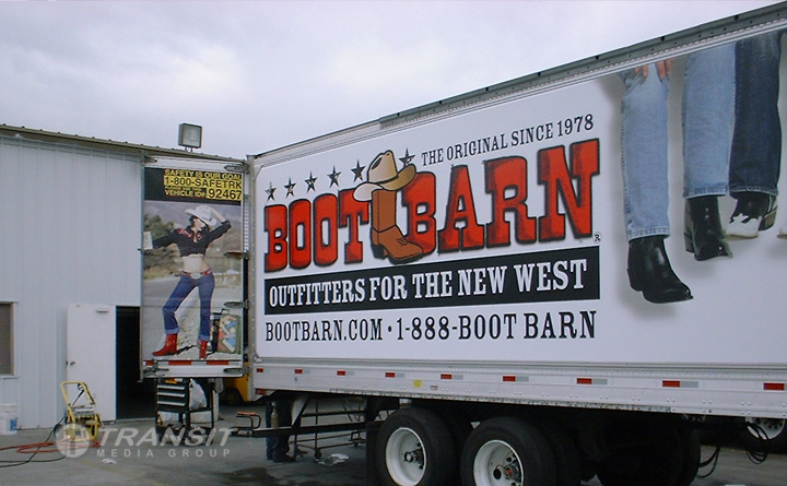 Boot Barn truckside advertising graphics being installed